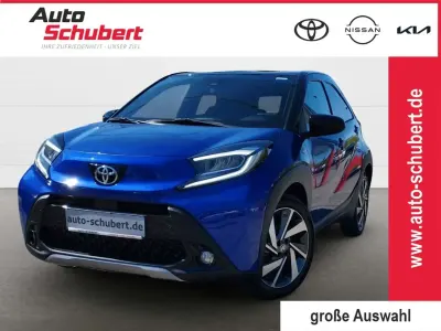 Gebraucht Toyota Aygo X X-plore 72 PS (52 kW) 2023 8y8)/ black mica (209) (blau SUV