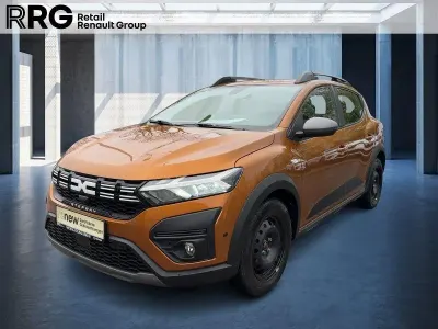 Gebraucht Dacia Sandero Expression 101 PS (74 kW) 2023 Taklamakanorange (orange) Limousine