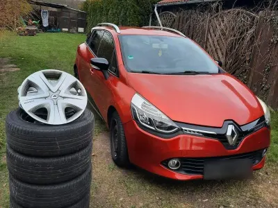 Używany Renault Clio IV Dynamique 73 KM (53 kW) 2013 Czerwony Sedan/Limuzyna