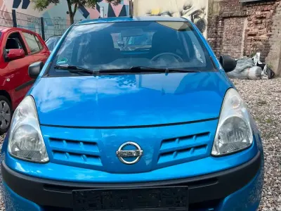 Gebraucht Nissan Pixo Visia 68 PS (50 kW) 2011 Blau Kleinwagen