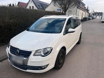 Second-hand VW Touran Freestyle 140 CP (102 kW) 2010 Alb Monovolum