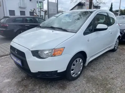 Gebraucht Mitsubishi Colt Motion 75 PS (55 kW) 2011 Porcelain white Kleinwagen