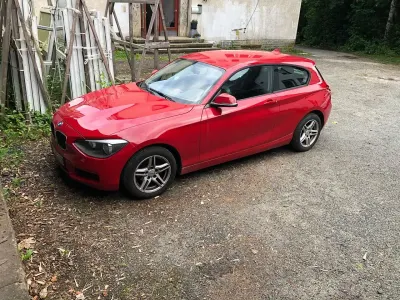 Gebraucht BMW 114 102 PS (75 kW) 2012 Rot Kleinwagen