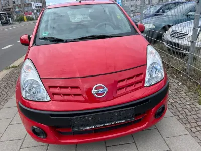Gebraucht Nissan Pixo Acenta 68 PS (50 kW) 2010 Rot Kleinwagen