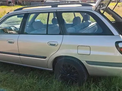 Gebraucht Mazda 626 136 PS (100 kW) 1999 Gold Kombi