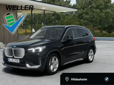 Gebraucht BMW iX1 Comfort Edition 230 kW (313 PS) 2025 Black sapphire (schwarz) SUV