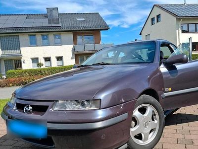Second-hand Opel Calibra 115 CP (84 kW) 1996 Gri Coupe