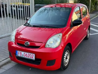 Gebraucht Daihatsu Cuore Plus 58 PS (42 kW) 2008 Rot Kleinwagen