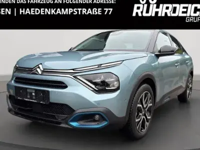 Używany Citroën e-C4 Shine 100 kW (136 KM) 2022 Niebieski Sedan/Limuzyna