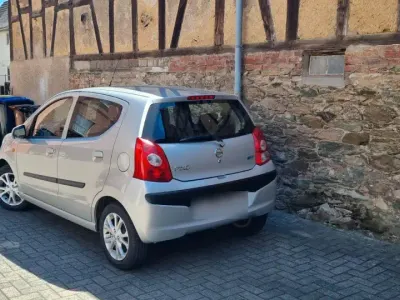 Gebraucht Nissan Pixo Acenta 68 PS (50 kW) 2010 Silber Kleinwagen
