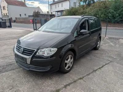 Gebraucht VW Touran Comfortline 140 PS (102 kW) 2010 Schwarz Van / Kleinbus