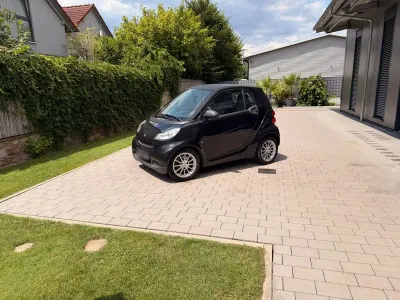 Gebraucht Smart ForTwo Coupé 61 PS (44 kW) 2011 Schwarz Coupé