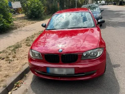 Gebraucht BMW 116 122 PS (89 kW) 2008 Rot Kleinwagen