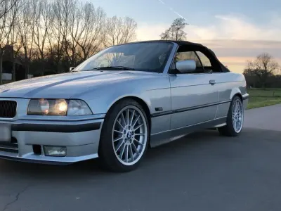 Gebraucht BMW 320 149 PS (109 kW) 1994 Silber Cabrio