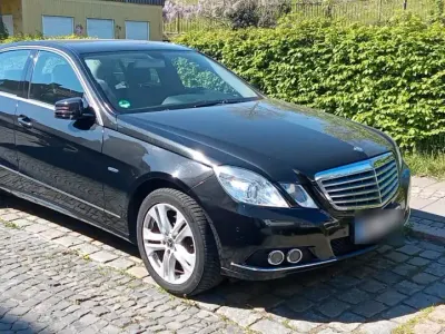 Second-hand Mercedes E200 184 CP (135 kW) 2009 Negru Berlinǎ