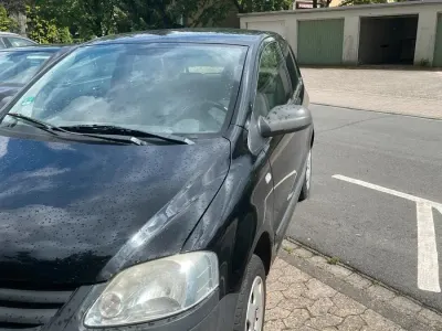 Gebraucht VW Fox 74 PS (54 kW) 2006 Schwarz Kleinwagen