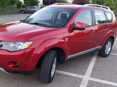 Begagnad Mitsubishi Outlander Invite 170 HK (125 kW) 2008 Röd SUV