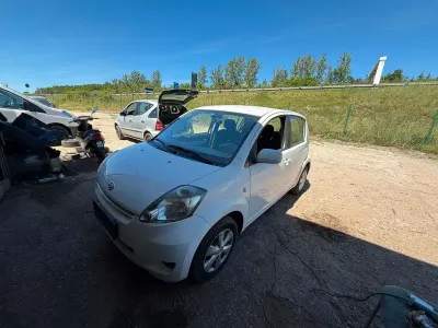 Gebraucht Daihatsu Sirion 69 PS (50 kW) 2011 Weiß Kleinwagen