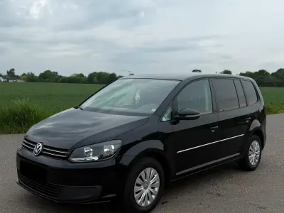 Gebraucht VW Touran Trendline 105 PS (77 kW) 2012 Schwarz Van / Kleinbus