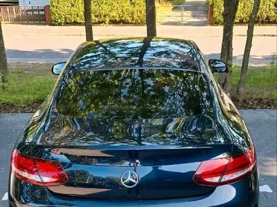 Gebraucht Mercedes C180 AMG line 156 PS (114 kW) 2020 Blau Coupé