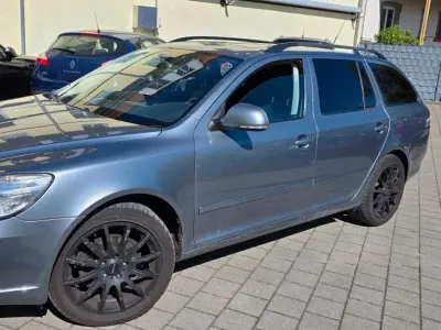Używany Skoda Octavia Sport 140 KM (102 kW) 2011 Szary Kombi