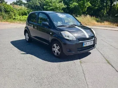 Gebraucht Daihatsu Sirion 91 PS (66 kW) 2009 Schwarz Kleinwagen