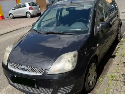 Gebraucht Ford Fiesta Ghia 69 PS (50 kW) 2007 Schwarz Kleinwagen