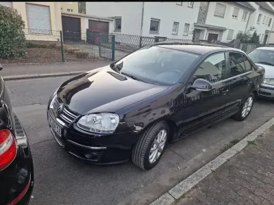 Używany VW Jetta Comfortline 122 KM (89 kW) 2010 Czarny Sedan/Limuzyna