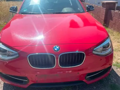 Gebraucht BMW 116 Sport Line 136 PS (100 kW) 2014 Rot Kleinwagen
