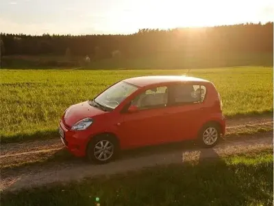 Gebraucht Daihatsu Sirion 91 PS (66 kW) 2009 Rot Kleinwagen
