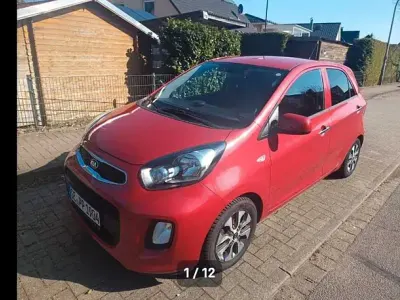 Używany Kia Picanto DREAM-TEAM Edition 86 KM (63 kW) 2016 Czerwony Hatchback