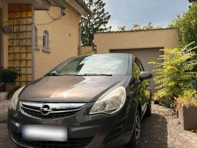 Gebraucht Opel Corsa 69 PS (50 kW) 2013 Grau Kleinwagen
