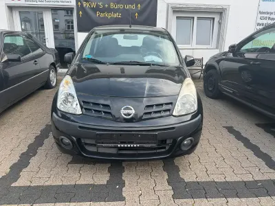 Gebraucht Nissan Pixo 67 PS (49 kW) 2009 Schwarz Kleinwagen