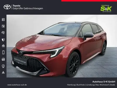 Gebraucht Toyota Corolla Basis 196 PS (144 kW) 2025 Metal oxide orange / black Kombi