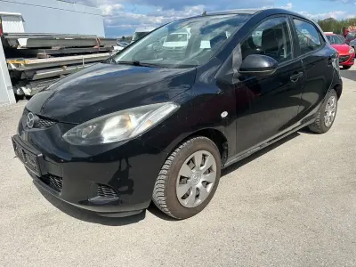 Gebraucht Mazda 2 Impuls 75 PS (55 kW) 2010 Schwarz Kleinwagen