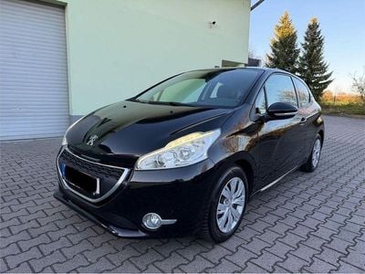 Gebraucht Peugeot 208 Active 82 PS (60 kW) 2012 Schwarz Kleinwagen