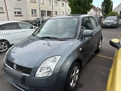 Używany Suzuki Swift 92 KM (67 kW) 2007 Szary Hatchback