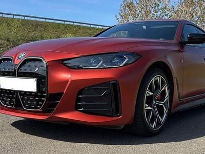 Second-hand BMW i4 Performance 250 kW (340 CP) 2024 Portocaliu Berlinǎ