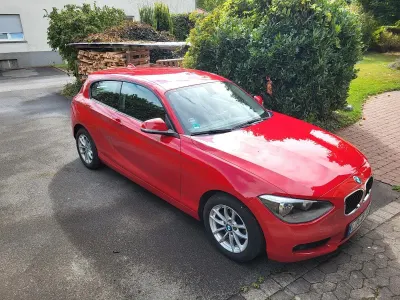 Gebraucht BMW 114 102 PS (75 kW) 2013 Rot Kleinwagen