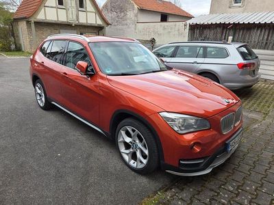 Używany BMW X1 xLine 150 KM (110 kW) 2014 Pomarańczowy SUV