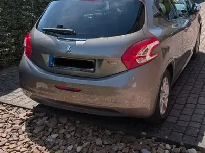 Gebraucht Peugeot 208 Style 82 PS (60 kW) 2013 Braun Kleinwagen
