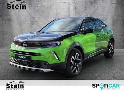 Gebraucht Opel Mokka-e Elegance 100 kW (136 PS) 2022 Matcha green/ikone gruen (metallic) SUV