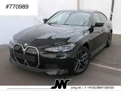 Gebraucht BMW i4 Sport Line 250 kW (340 PS) 2023 Black sapphire metallic Limousine