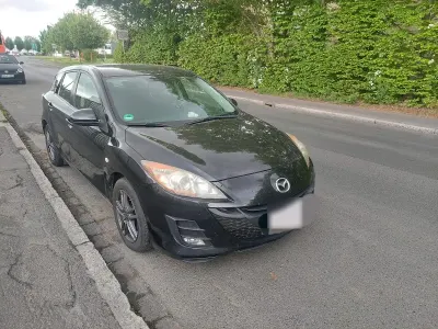 Używany Mazda 3 150 KM (110 kW) 2011 Czarny Sedan/Limuzyna