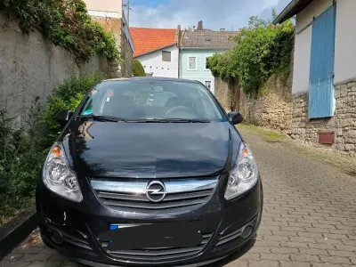 Używany Opel Corsa 60 KM (44 kW) 2009 Czarny Hatchback