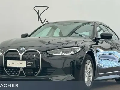 Gebraucht BMW i4 Sport Line 250 kW (340 PS) 2023 Saphirschwarz metallic Limousine