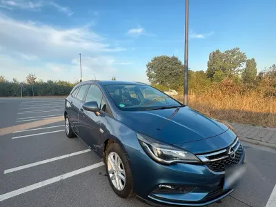 Gebraucht Opel Astra Active 110 PS (80 kW) 2017 Blau Kombi