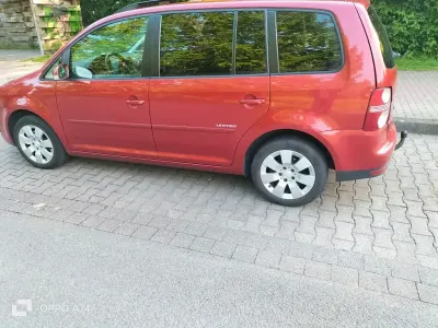Gebraucht VW Touran United 140 PS (102 kW) 2009 Rot Van / Kleinbus