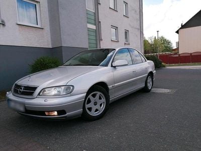 Second-hand Opel Omega 144 CP (105 kW) 2001 Argintiu Berlinǎ
