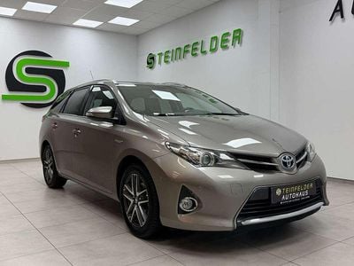 Gebraucht Toyota Auris Hybrid 99 PS (72 kW) 2015 Braun Kombi
